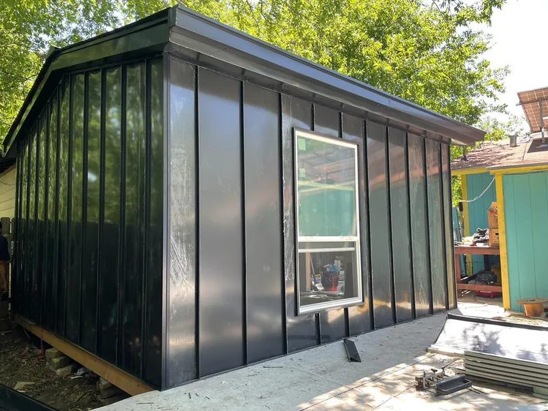 Black standing seam metal wall panels for Roof Inspection in Fort Wright