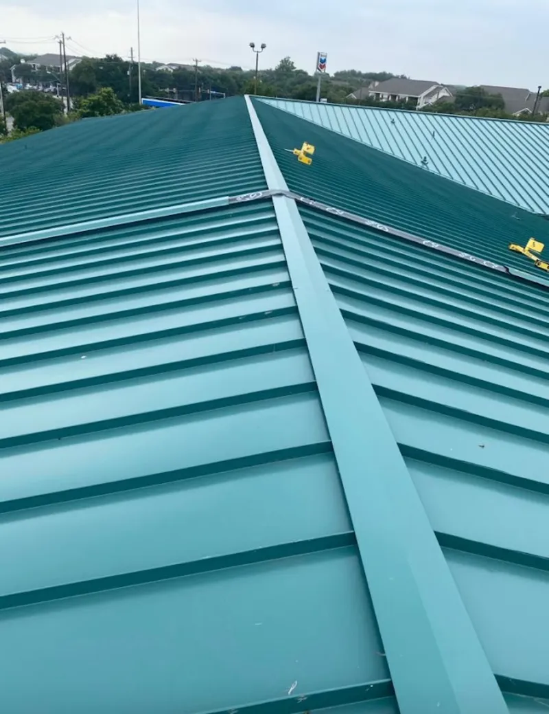 Green commercial metal roof ridge and valley for Metal Roof Repair in Fort Wright