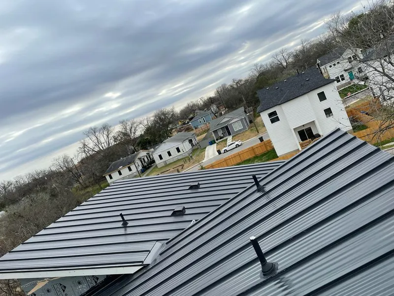 Standing seam metal roof panels with vents for Skylight Repair in Fort Wright